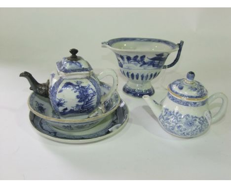 A collection of 18th and 19th century Chinese blue and white ceramics including a teapot of four sided form with landscape de
