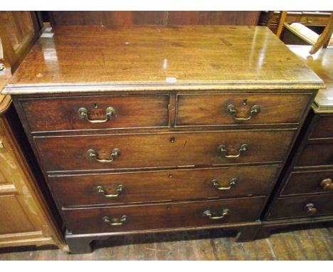 A Georgian mahogany chest of three long and two short drawers with brass swan neck handles on bracket supports, 103 cm wide a