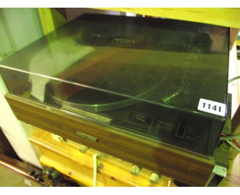 A vintage Pioneer record player/deck, model number PL-120, together with a Rotel RA-611 Solid State stereo amplifier