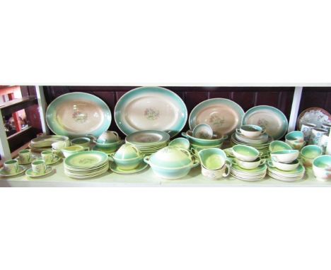 (Displayed on green baize) An extensive collection of Susie Cooper Dresden spray pattern dinner wares comprising six oval gra