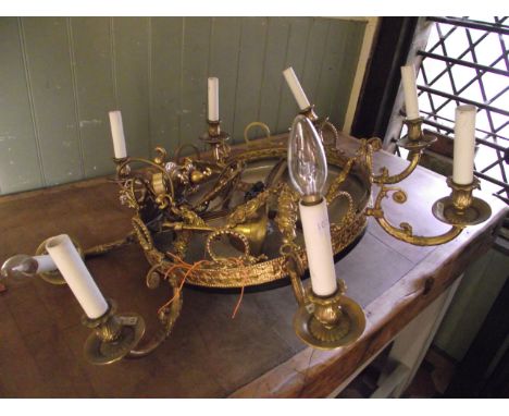 A Regency style plafonnier type electrolier hanging ceiling light, the decorative cast gilt metal frame with eight scrolling 