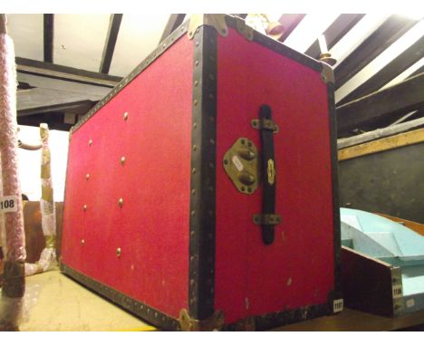 An "Overpond" red painted and reinforced cabin trunk