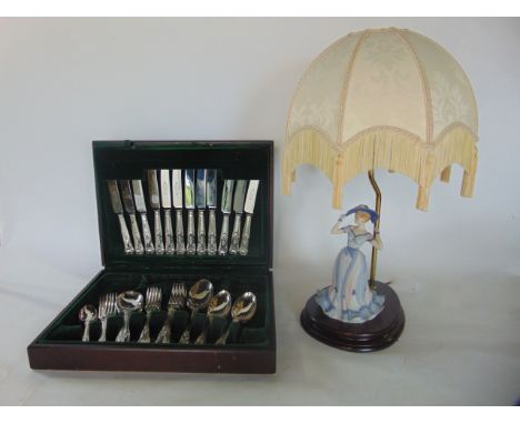 A Coalport Age of Elegance porcelain table lamp and canteen containing fiddle and shell pattern plated flatware 