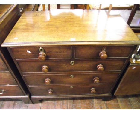 A Georgian mahogany chest of three long and two short drawers raised on bracket supports, 100 cm wide approx