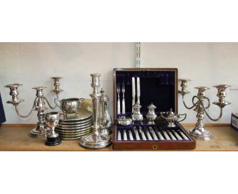 A partial oak cased set of 19th century side knives and forks with mother-of-pearl handles, together with a pair of three div