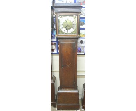 An 18th century oak longcase clock, the trunk with full length door with marquetry starburst decoration, the hood with simple