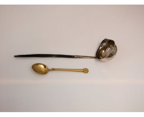 A Georgian silver toddy ladle, probably Edward Mayfield, London, indecipherable date mark, of plain form, with twisting whale