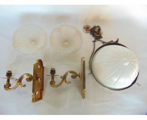 A pair of brass electronic single sconce wall lights, with scrolling stems together with a ceiling light with opaque glass sh