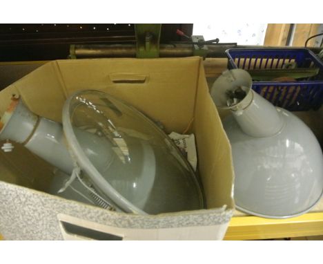 A pair of vintage grey and cream enamel pendant lights, the domed shades with convex glass panels both with applied paper lab
