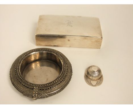 A white metal coaster, of eastern style, 13cm diameter; a Sterling silver miniature novelty jockey cap caddy spoon, with vaca