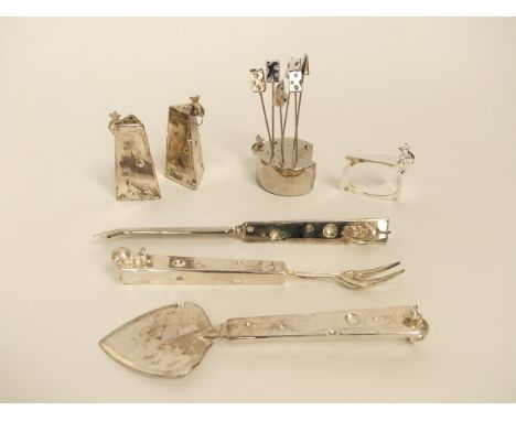A nickel plate mouse and cheese suite, Silea, comprising: a knife, a fork, a server, a pepper pot, a salt pot, aperitif picks