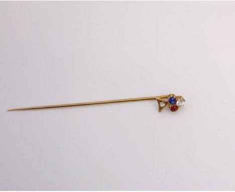 An Edwardian style stick pin, terminating with an "Ace of Clubs" motif set with a diamond, an untested sapphire and an untest