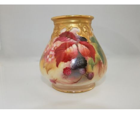 A Royal Worcester ivory ground vase of lobed form with painted blackberry and bramble decoration, signature K Blake and print