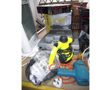 A Wagner W14 steam wallpaper stripper in original packaging, a Black & Decker electric fret saw model number DN533E also in o
