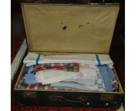 A 20th century navy blue banded travelling trunk containing a quantity of Ralph Lauren labelled fitted sheets etc