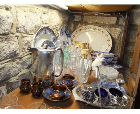 A mixed selection of glasswares to include a Galway crystal vase of oval form, various decanters, jugs etc together with a la