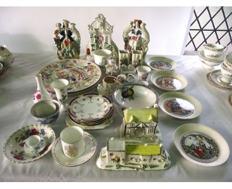 A collection of ceramics including a pair of 19th century Staffordshire figure groups of a boy and a girl flanked by a sheep 