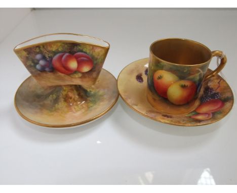 A Royal Worcester cabinet coffee can and saucer with painted fruit decoration, the coffee can signed A Shuck, the saucer sign