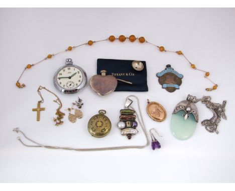 A 9ct gold crucifix pendant, on a fine 9ct gold chain; a pair of 9ct gold stud earrings; a pair of silver earrings, each term
