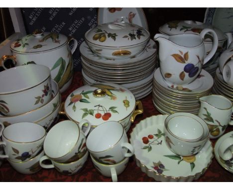 A extensive collection of Royal Worcester Evesham pattern oven to table wares including a large two handled serving dish and 