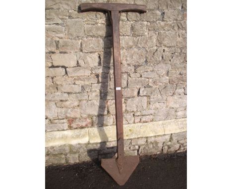 A vintage turf/peat spade with long T shaped ashwood handle