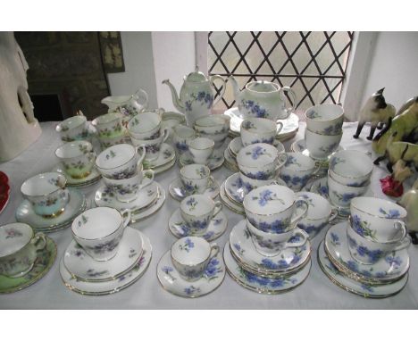 A quantity of Adderley tea and coffee wares with printed blue cornflower decoration comprising, teapot, four cake plates, cof