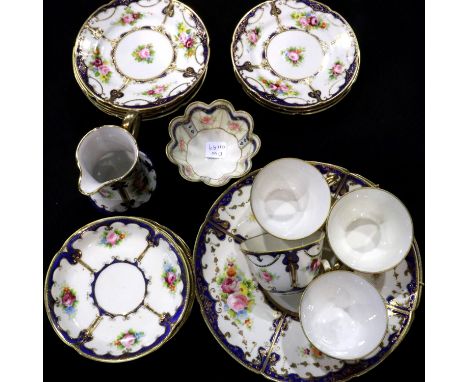Noritake gilt and blue tea service, twenty seven pieces, small chips to multiple plate rims, wear to gilt. P&amp;P Group 3 (£