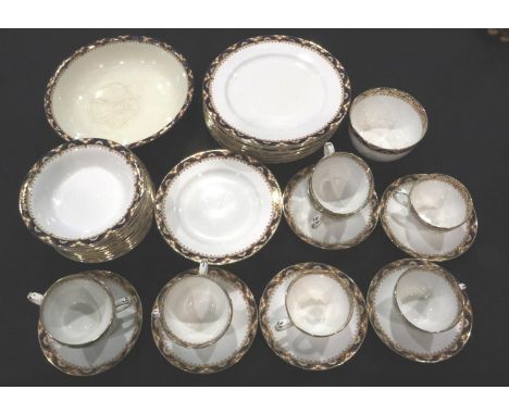 Edwardian tea service, gilt with blue bands, by Foley China, forty eight pieces, hairline crack to one cup and saucer, marks 