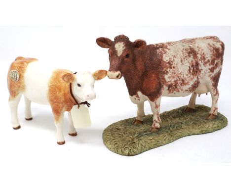 Two Border Fine Arts cows, largest H: 11 cm, no cracks or chips. P&amp;P Group 2 (£18+VAT for the first lot and £3+VAT for su