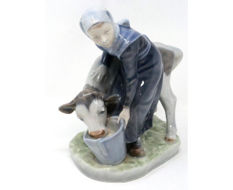 Royal Copenhagen figurine of a girl feeding a calf, H: 16 cm, no cracks or chips. P&amp;P Group 1 (£14+VAT for the first lot 