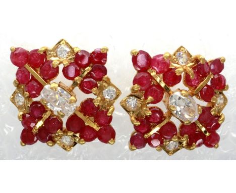 Pair of 18ct gold ruby and cubic zirconia set stud earrings, 5.6g. P&amp;P Group 1 (£14+VAT for the first lot and £1+VAT for 