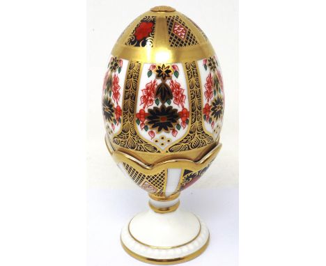 Royal Crown Derby Easter egg in egg cup, pattern 1128, no chips or cracks, H: 17 cm. P&amp;P Group 1 (£14+VAT for the first l