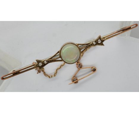 9ct gold brooch set with an opal and seed pearls, L: 60 mm, 3.2g. P&amp;P Group 1 (£14+VAT for the first lot and £1+VAT for s