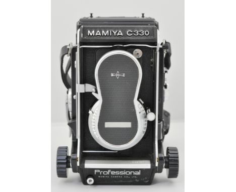 Mamiya C330 camera, height 18cm with accessories, boxed and cased.