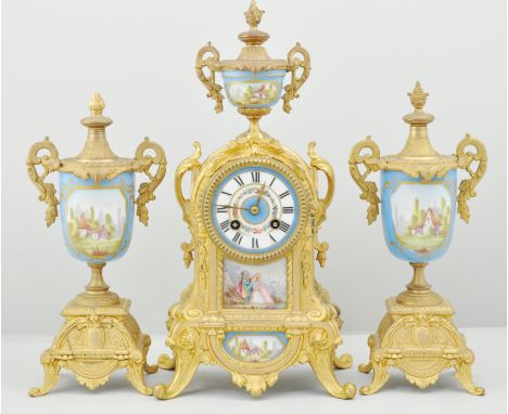 19th Century French gilt spelter clock garniture, "Sevres" porcelain panels, hand painted, comprising a clock with an urn fin