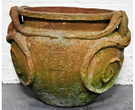 Compton style terracotta planter, decorated with snakes, width 64cm.