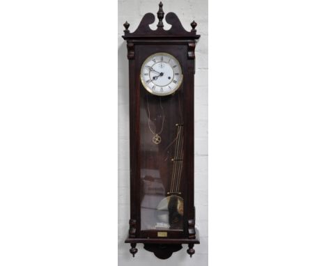 German Vienna type wall clock, swan neck pediment, with urn finial, glazed door, circular dial with Roman numerals, subsidiar