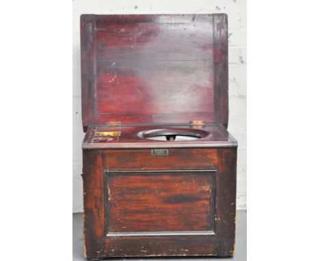 Victorian walnut commode, blue and white transfer pan, with brass pump.