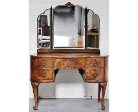 Burr walnut bedroom suite, comprising bowfront triple wardrobe, width 154cm, carved cresting, cabriole legs, fitted interior,