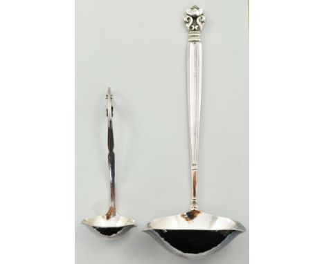 Georg Jensen sterling silver ladle, hammered bowl, length 20cm and a smaller Jensen silver ladle with a foliate handle (2).