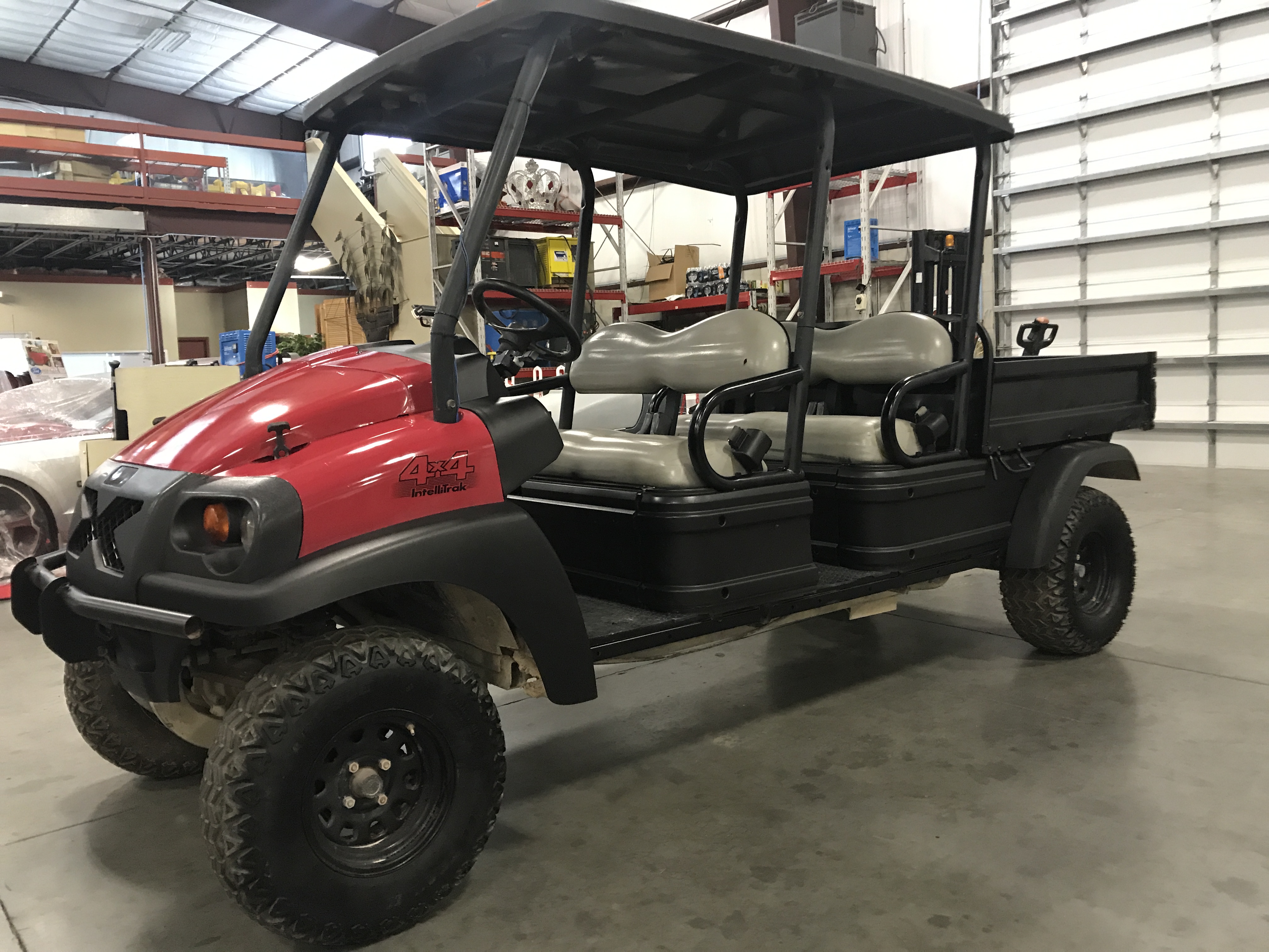 CLUB CAR 4 SEAT SIDE BY SIDE, 4X4 INTELLITRAK, DIESEL ENGINE, DUMP BED