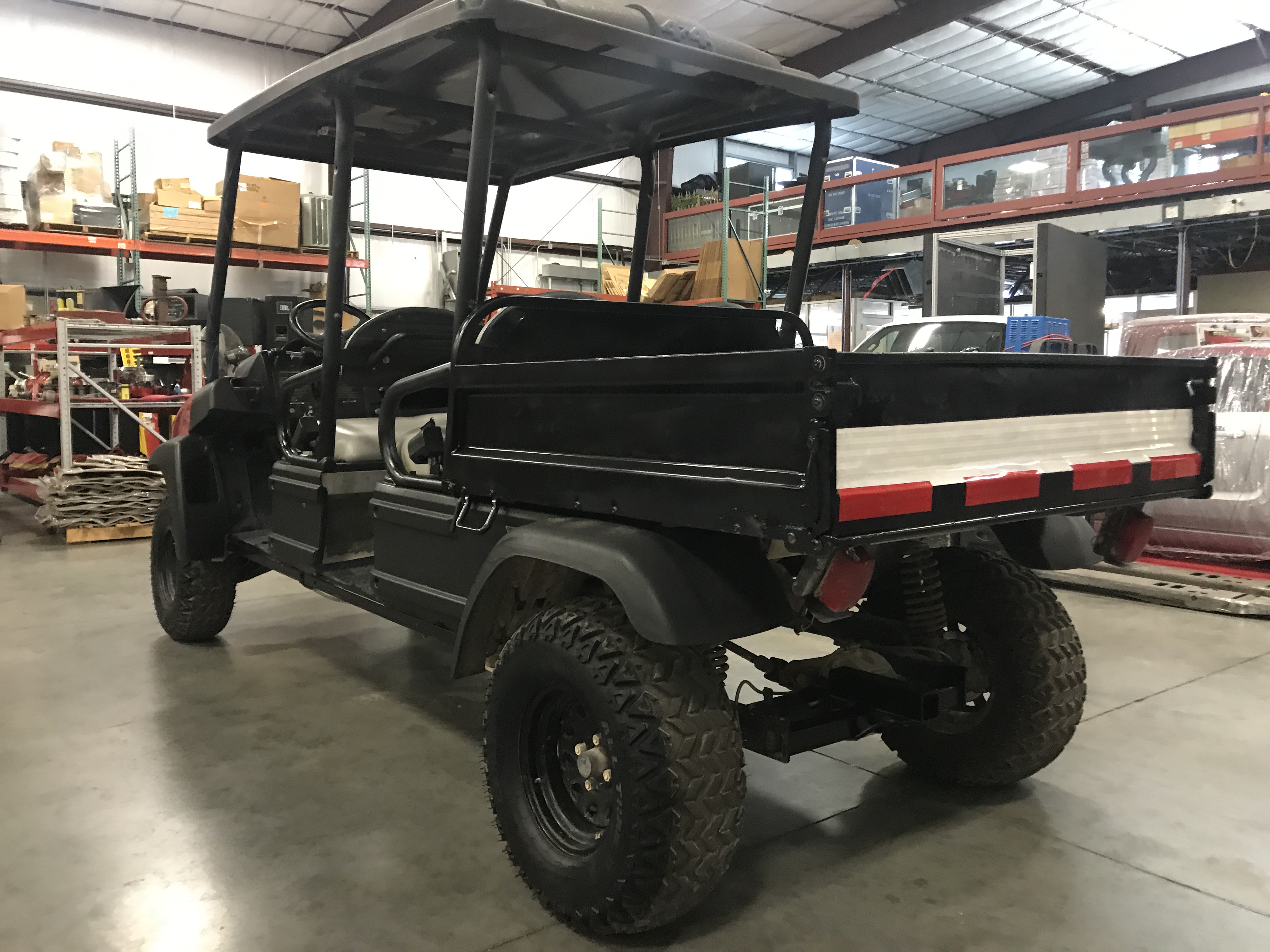 CLUB CAR 4 SEAT SIDE BY SIDE, 4X4 INTELLITRAK, DIESEL ENGINE, DUMP BED