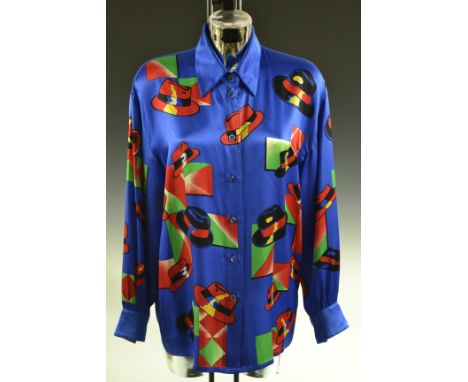 An Escada silk round neck blouse, brightly printed in multi-coloured nautical images, gold colour buttons, size 38; an Escada