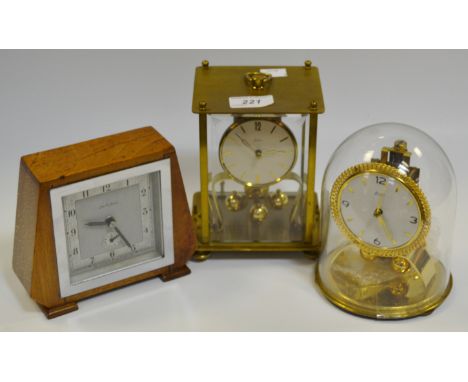 A Kundo German 10 jewel carriage clock; another similar; John D Francis art deco walnut mantle clock (3)