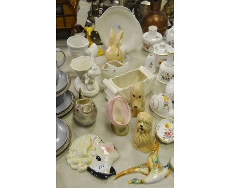 Decorative Ceramics - an Art Deco wall plaque of an elegant young lady; a Shorter and Sons jug in the form of a fish, another