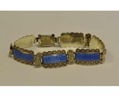 An early 20th century silver and enamel articulated bracelet 