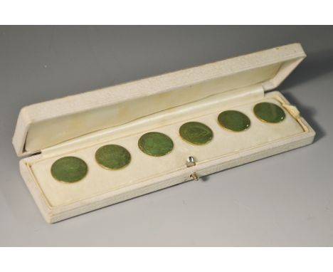 A set of six Art Deco enamel and gilt brass circular buttons, each applied with a jade green polished enamel surface, size 28