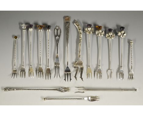 Pickle Forks - an Edwardian silver pickle fork, the moulded thistle terminal surmounted with a faceted purple stone, Adie & L