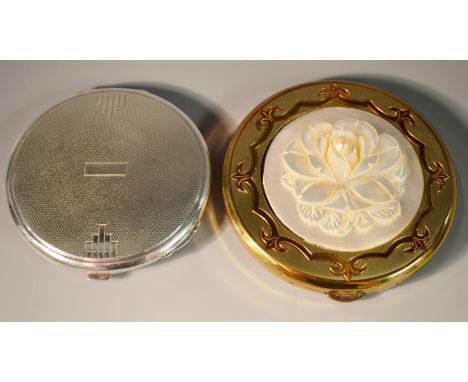 Powder Compacts - an Art Deco silver circular powder compact, engine turned, vacant central rectangular cartouche, the hinged