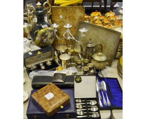 A cased silver condiment set, Birmingham 78.7g gross; silver plated candelabra; silver plated tankard; cased plated Apostle s